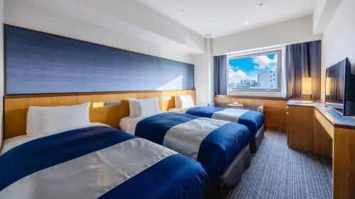 Habitación Triple del hotel Gracery Osaka Namba. Foto 14