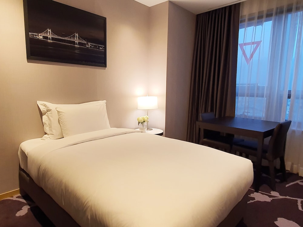 Habitación familiar (Avani Deluxe) del hotel Avani Central Busan. Foto 1