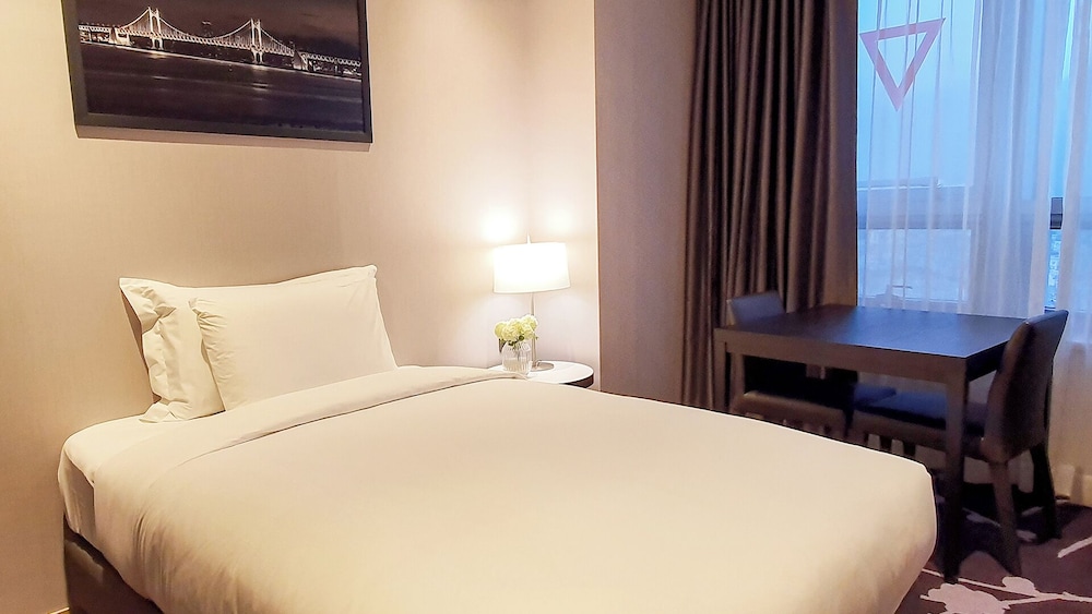 Habitación familiar (Avani Deluxe) del hotel Avani Central Busan. Foto 2