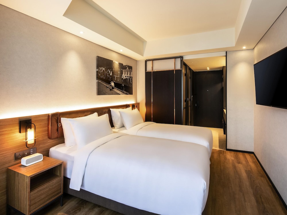 Habitación superior, 2 camas individuales del hotel Mercure Ambassador Seoul Hongdae. Foto 3