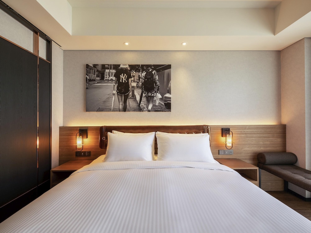 Habitación Superior Deluxe, 1 cama King con balcón del hotel Mercure Ambassador Seoul Hongdae. Foto 1