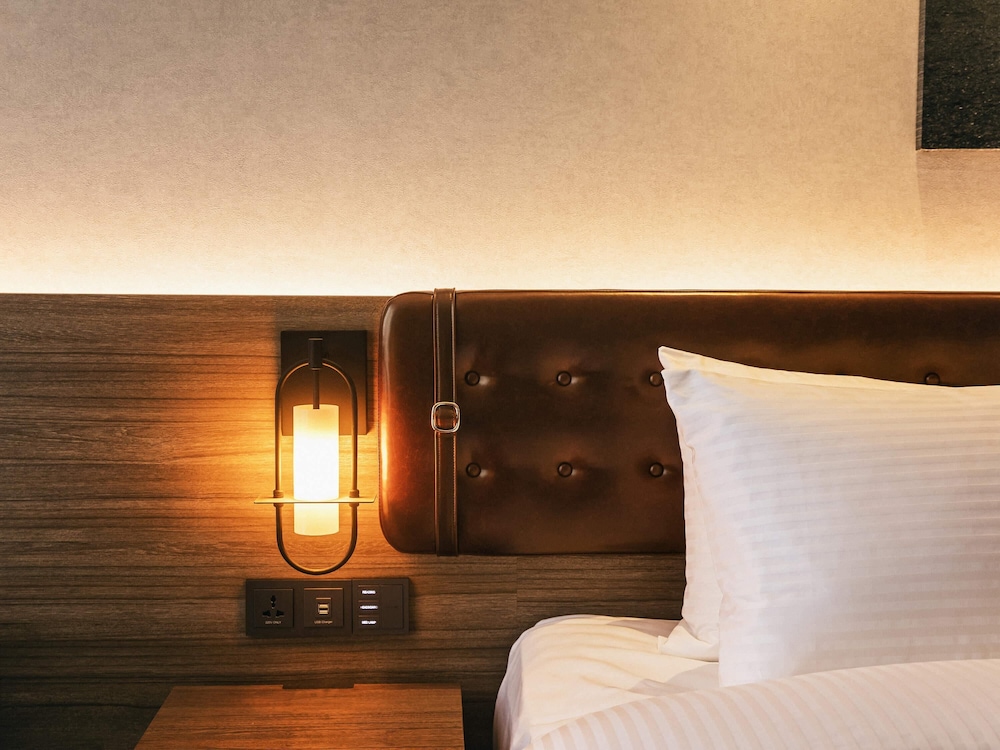 Habitación Superior Deluxe, 2 camas individuales con balcón del hotel Mercure Ambassador Seoul Hongdae. Foto 3