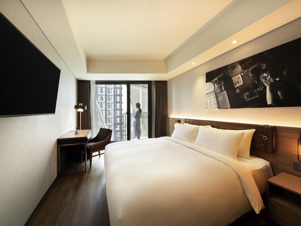 Habitación Superior Deluxe, 1 cama King con balcón del hotel Mercure Ambassador Seoul Hongdae. Foto 7