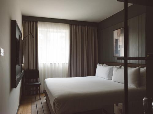 Habitación Doble Estándar del hotel The Honest Budapest by chic&basic. Foto 3