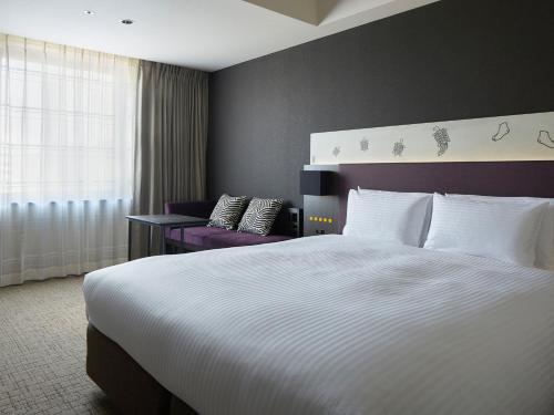 Habitación Estándar - 1 cama grande del hotel Mitsui Garden Hotel Kyobashi. Foto 1