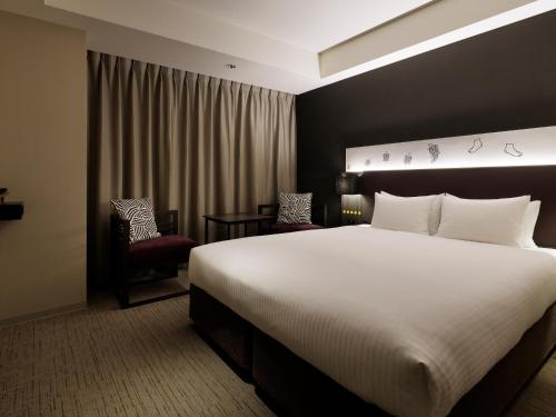 Habitación Superior - 1 cama grande del hotel Mitsui Garden Hotel Kyobashi. Foto 1