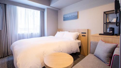Habitación Doble Estándar del hotel KOKO HOTEL Hidatakayama. Foto 3