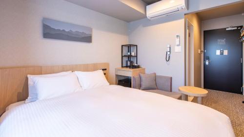 Habitación Doble Estándar del hotel KOKO HOTEL Hidatakayama. Foto 4