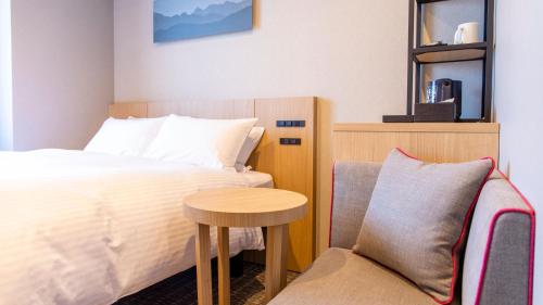 Habitación Doble Estándar del hotel KOKO HOTEL Hidatakayama. Foto 5