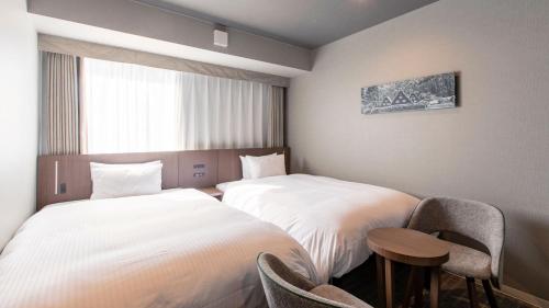 Habitación Doble Superior - 2 camas del hotel KOKO HOTEL Hidatakayama. Foto 5