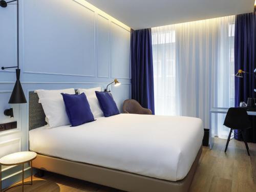 Habitación Doble Clásica con vistas al jardín del hotel Mercure Porto Centro Aliados. Foto 4