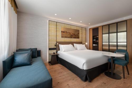 Habitación Doble con cama supletoria del hotel Eurostars Aliados. Foto 3