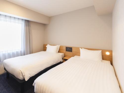 Habitación Doble Estándar - 2 camas - No fumadores del hotel Sotetsu Fresa Inn Hiroshima