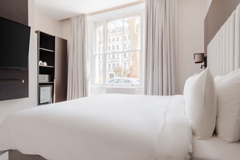 Habitación estándar con 1 cama doble o 2 individuales del hotel Rove London Paddington. Foto 2