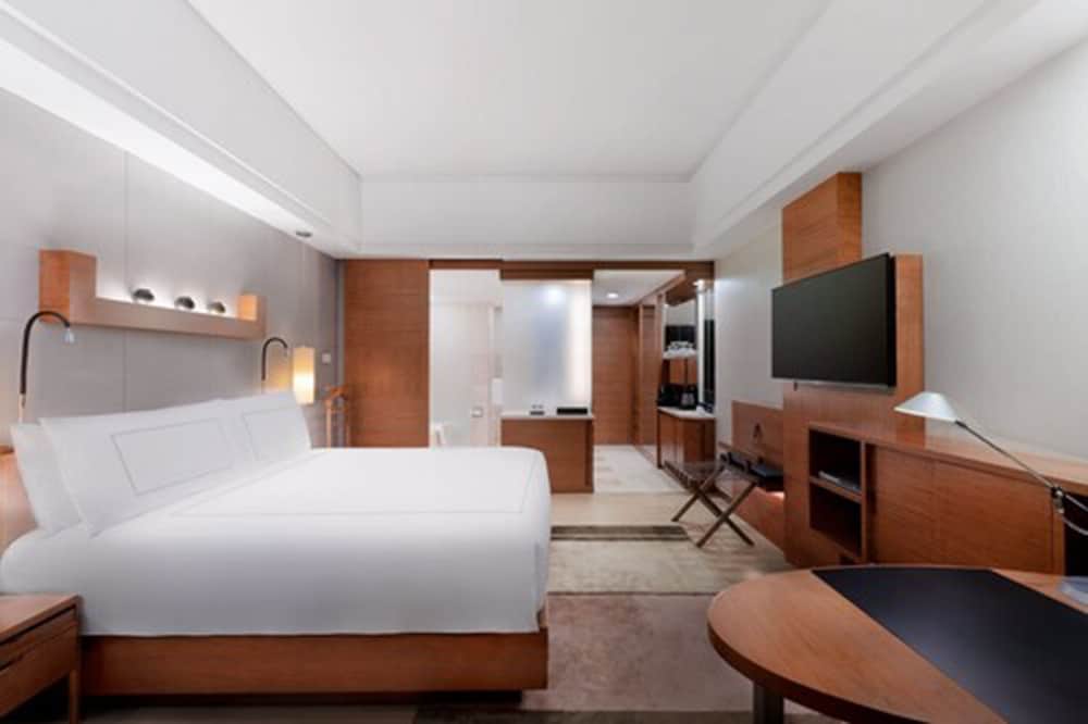 Habitación doble 1 Cama king Vista ciudad Club Business del hotel Swissotel Grand Shanghai. Foto 1