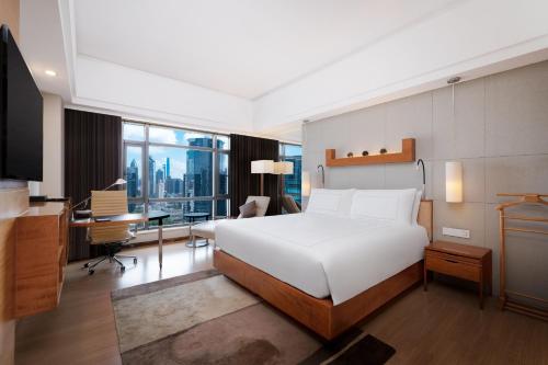 Habitación King Ejecutiva Suiza del hotel Swissotel Grand Shanghai. Foto 6