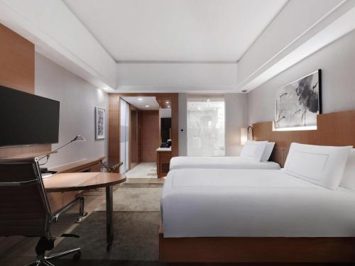 Habitación Matrimonial Ventaja Suiza del hotel Swissotel Grand Shanghai