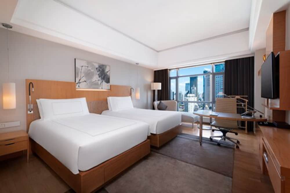 Habitación doble 1 Cama king Vista ciudad 2 Camas individuales del hotel Swissotel Grand Shanghai