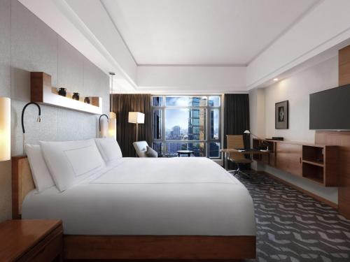 Habitación Matrimonial Clásica del hotel Swissotel Grand Shanghai