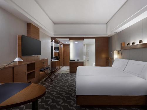 Habitación Matrimonial Clásica del hotel Swissotel Grand Shanghai. Foto 1