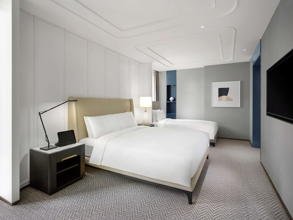Habitación Familiar de Lujo con 1 Cama King y 1 Cama Individual del hotel Sofitel Ambassador Seoul and Serviced Residences. Foto 1