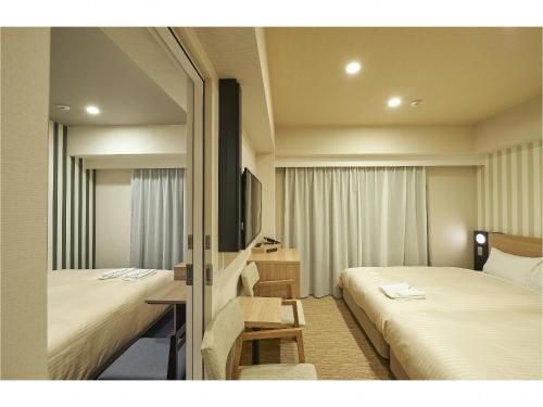 Habitaciones comunicadas - No fumadores del hotel Sotetsu Fresa Inn Kamakura Ofuna Higashiguchi. Foto 1