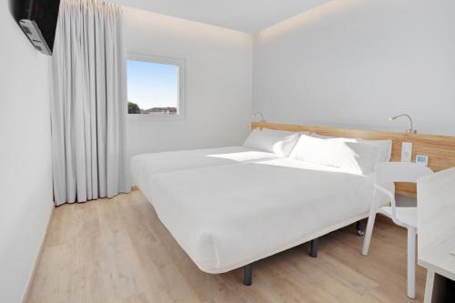 Habitación Doble - 2 camas del hotel B&B Porto Expo Aeroporto. Foto 1