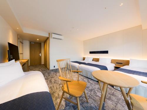 Habitación familiar 2 Camas individuales del hotel Tokyu Stay Hida-takayama Musubi No Yu. Foto 13