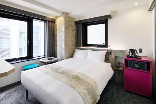 Habitación asignada al hacer el registro de entrada del hotel the b ginza