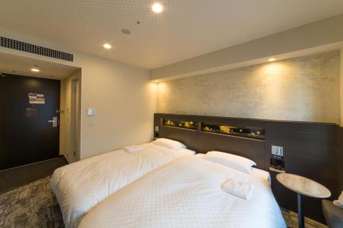 Habitación Doble - 2 camas - No fumadores del hotel Jr West Group Via Inn Prime Kyotoeki Hachijoguchi. Foto 3