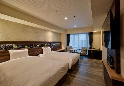 Habitación Doble Deluxe - No fumadores - 2 camas del hotel Jr West Group Via Inn Prime Kyotoeki Hachijoguchi. Foto 4