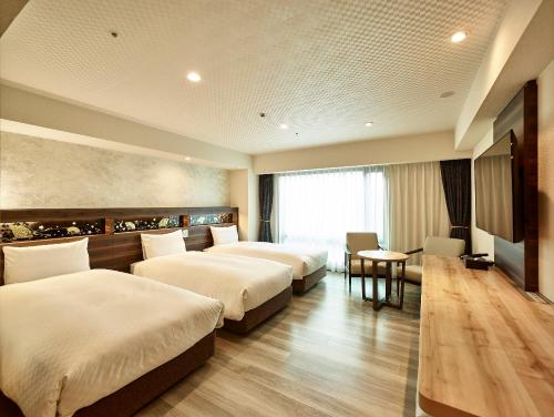 Habitación Triple - No fumadores del hotel Jr West Group Via Inn Prime Kyotoeki Hachijoguchi. Foto 1