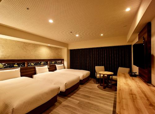 Habitación Triple - No fumadores del hotel Jr West Group Via Inn Prime Kyotoeki Hachijoguchi. Foto 3