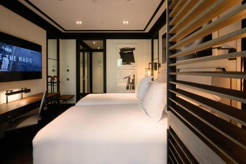 Habitación Doble Básica con acceso al spa del hotel Seventy Barcelona. Foto 2