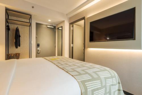 Habitación Confort accesible según la ADA del hotel Pestana CR7 Times Square. Foto 3