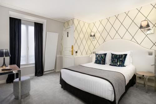 Habitación Doble Clásica del hotel LE ROYAL RIVE GAUCHE. Foto 2