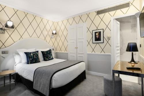 Habitación Doble Clásica del hotel LE ROYAL RIVE GAUCHE. Foto 3