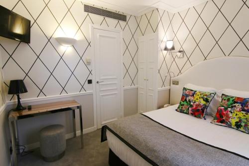 Habitación Individual Clásica del hotel LE ROYAL RIVE GAUCHE. Foto 3