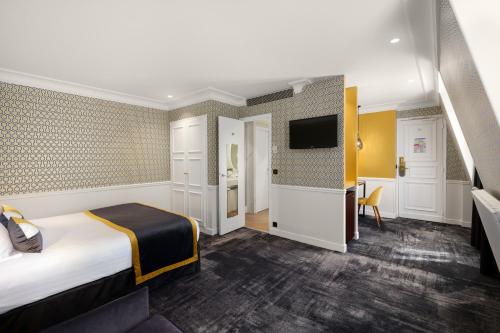 Junior suite Con Vistas Sofá Cama incluido 2 Camas individuales del hotel LE ROYAL RIVE GAUCHE. Foto 1