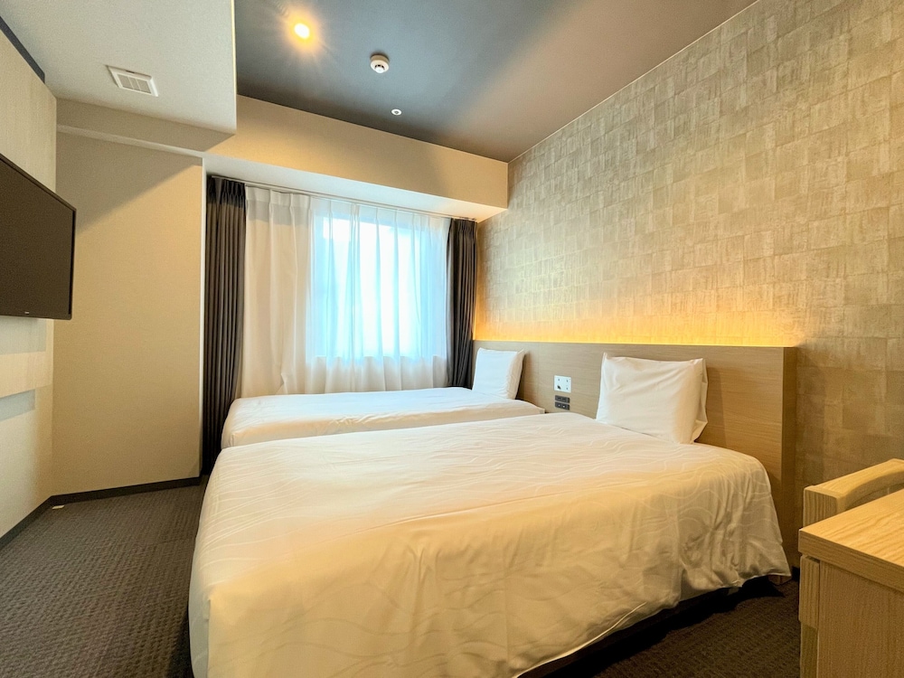 Habitación estándar con 2 camas individuales del hotel Henn Na Kanazawa Korinbo
