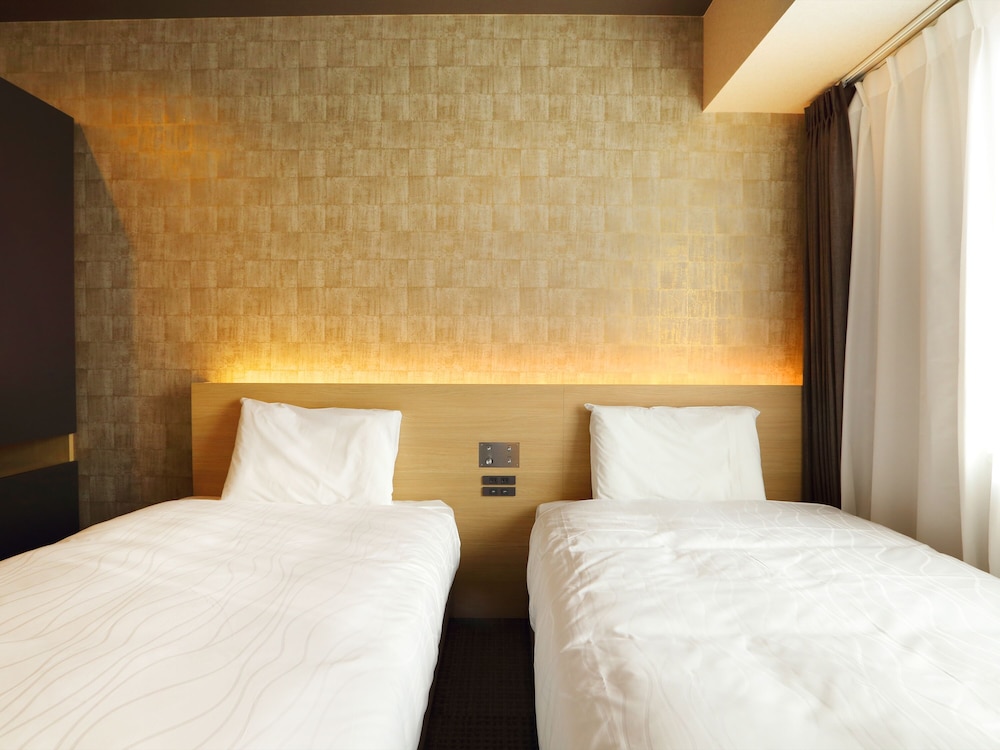 Habitación estándar con 2 camas individuales del hotel Henn Na Kanazawa Korinbo. Foto 1