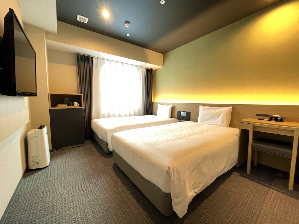Habitación superior con 2 camas individuales del hotel Henn Na Kanazawa Korinbo