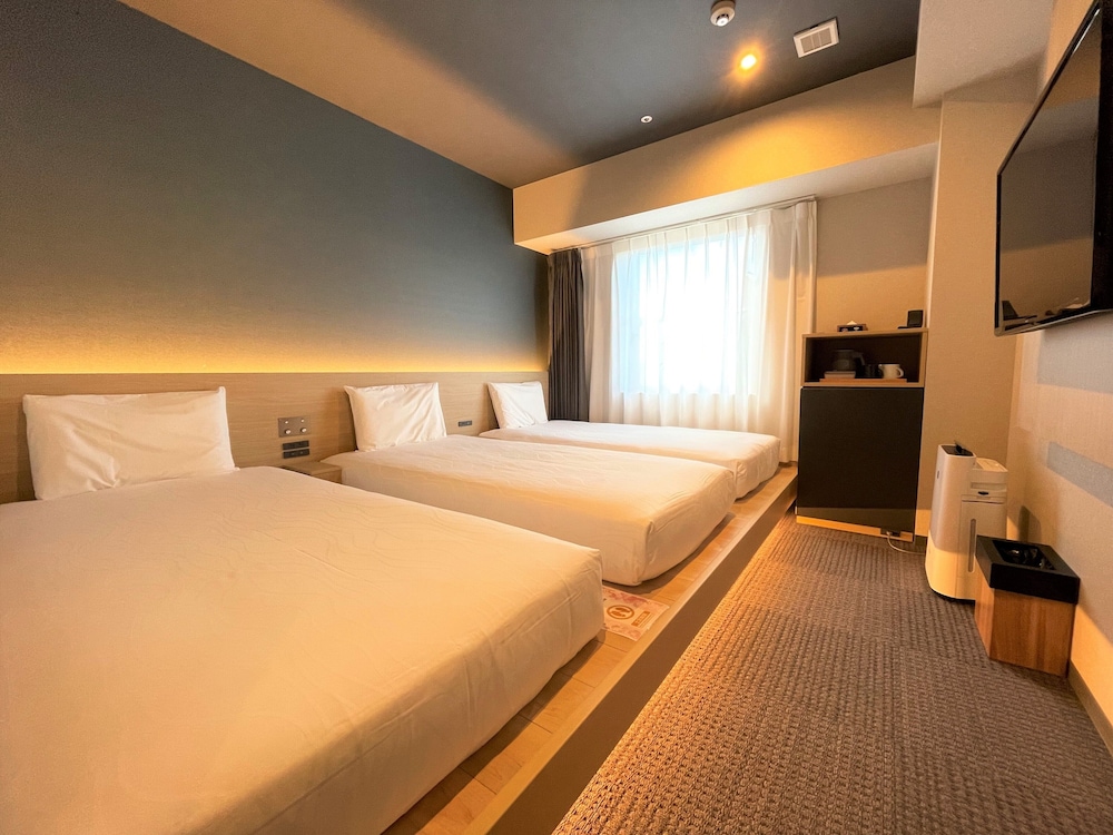 Habitación triple (Japanesque) del hotel Henn Na Kanazawa Korinbo
