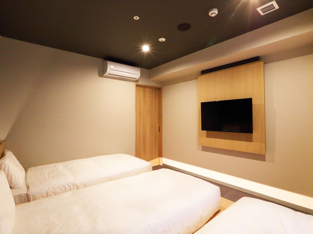 Habitación triple (Japanesque) del hotel Henn Na Kanazawa Korinbo. Foto 2