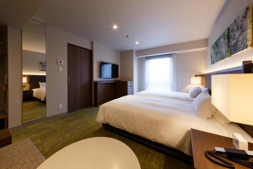 Relaxing Twin Room with Sofa del hotel Forza Kanazawa. Foto 3