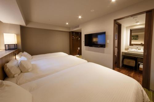 Habitación Triple Superior del hotel Forza Kanazawa. Foto 1