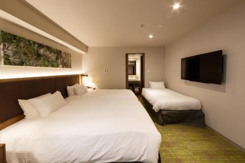 Habitación Triple esquinera del hotel Forza Kanazawa. Foto 6