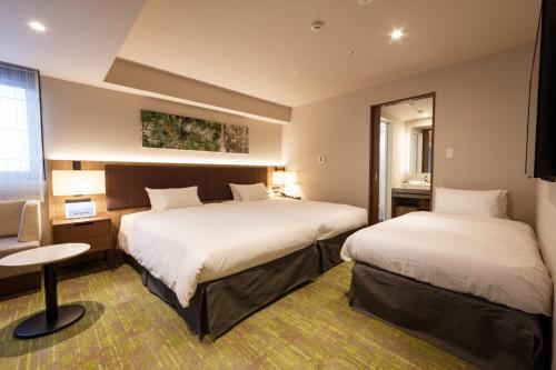 Habitación Triple esquinera del hotel Forza Kanazawa. Foto 7