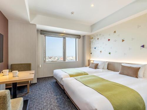 Habitación Doble Residencial 2 camas del hotel Tokyu Stay Kanazawa. Foto 1