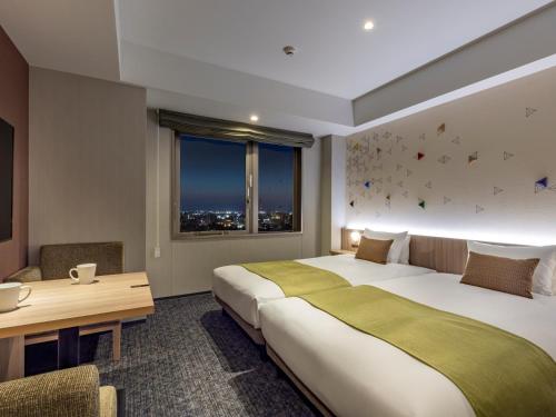 Habitación Doble Residencial 2 camas del hotel Tokyu Stay Kanazawa. Foto 4